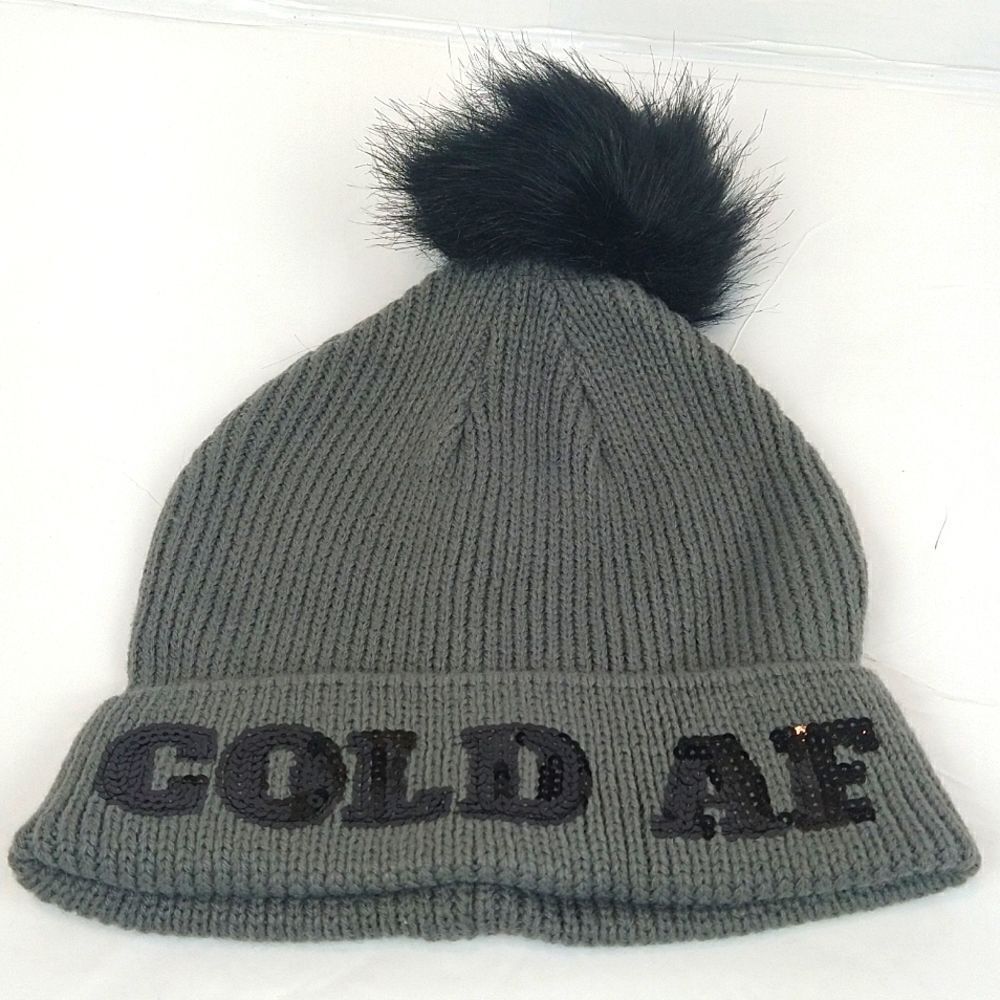 Women's gray knit beanie with black sequin letters and faux fur pom